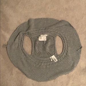 Sleeveless cardigan with option to tie in front